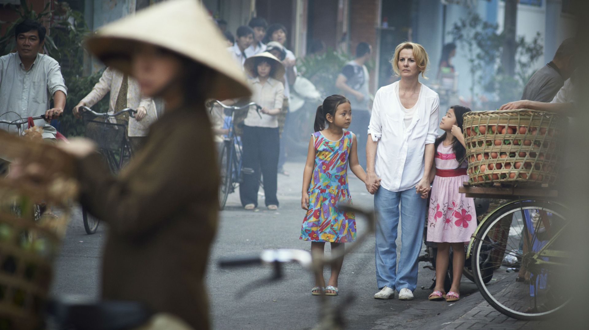Deirdre O'Kane (Christina Noble), Guong Thi Tong (Thao), and Thi Nhung Nguyen (Hang) in 'Noble'