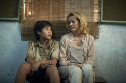 Deirdre O'Kane (Christina Noble) and Tien Dat Nguyen (Lam) in 'Noble'