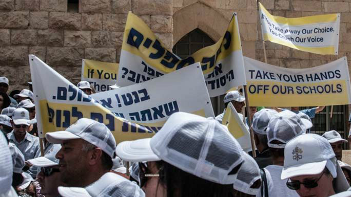 Hundreds of parents and students protest the treatment of Christian schools in Israel.