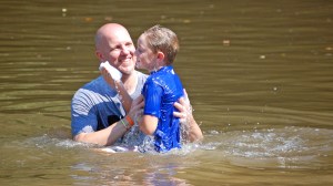 A scene from First Baptist Convington's annual mass baptism at Bogue Falaya Park