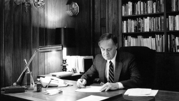 David Winter at his desk in the president's office at Westmont.