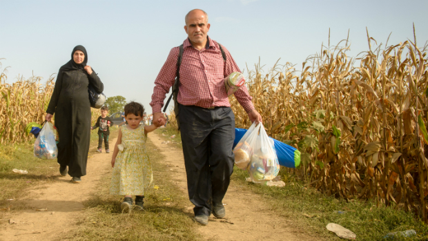 A refugee family from the Middle East makes their way from Serbia into Croatia.