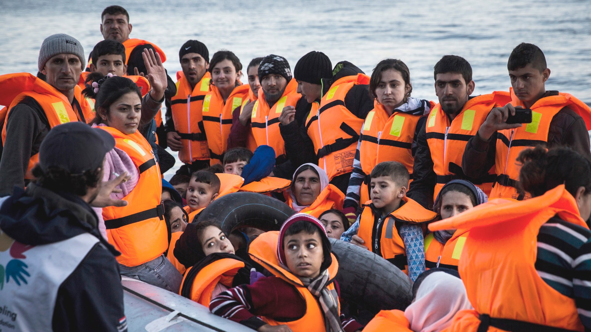 Syrian refugees disembark on the Greek island of Lesbos after crossing the sea from Turkey last week.
