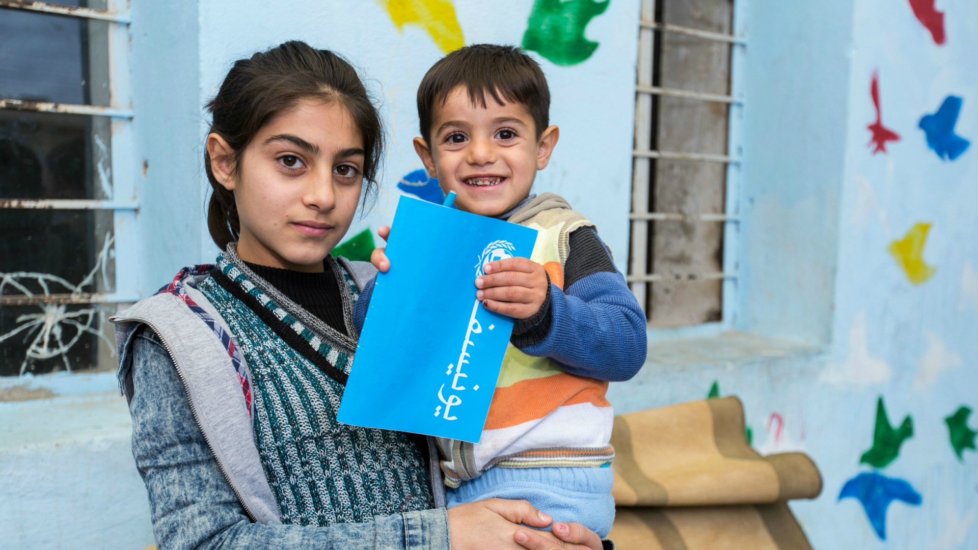 Syrian refugees currently living in a former prison in Iraqi Kurdistan.