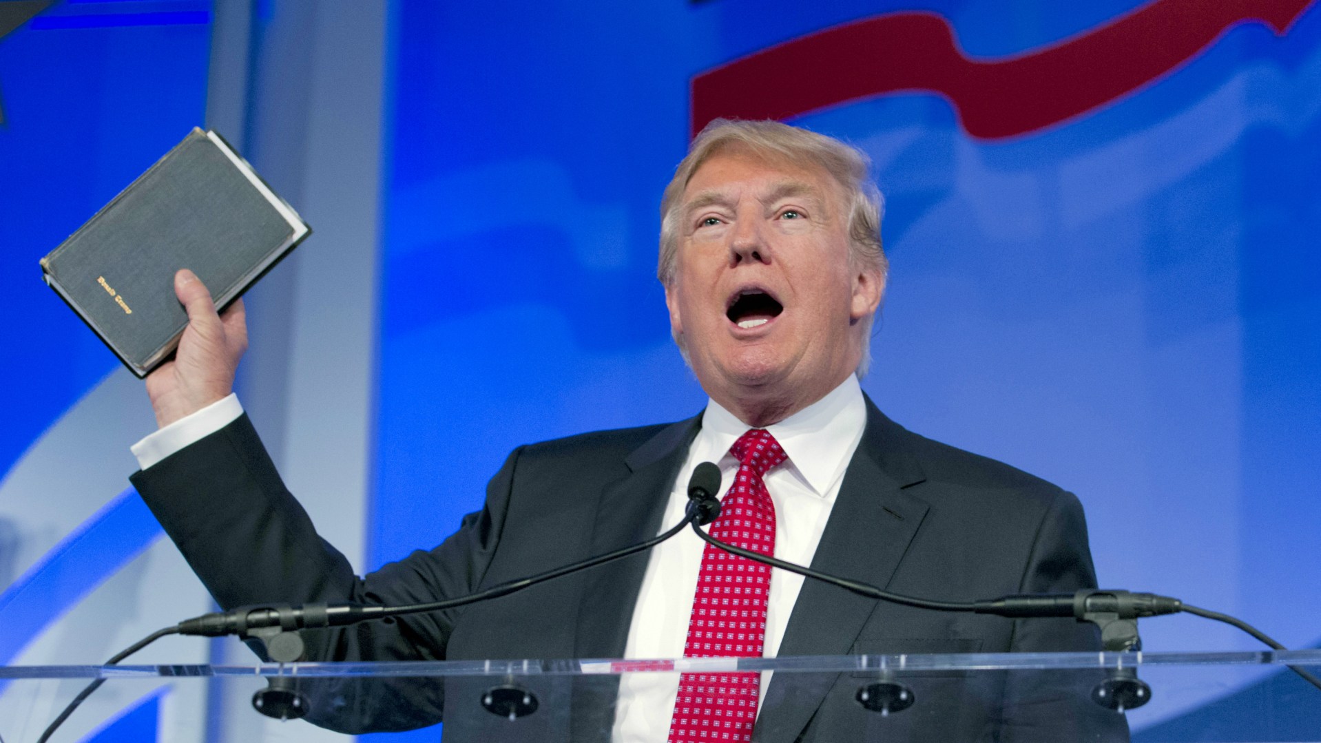 Donald Trump displays his family Bible at September's Values Voter Summit.