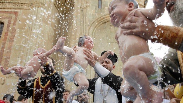 An Orthodox mass infant baptism near Tbilisi, Georgia.