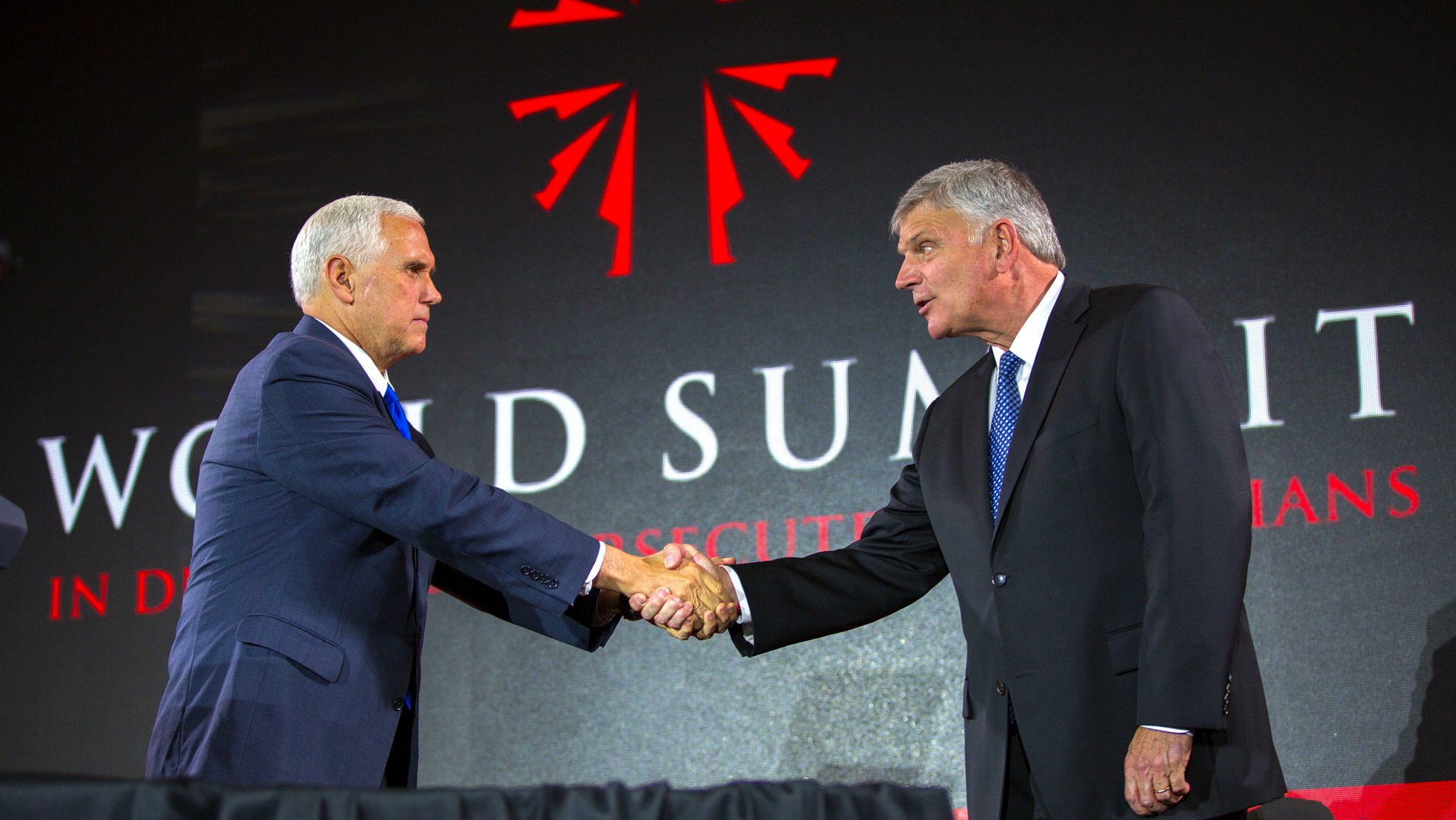 Franklin Graham greets Mike Pence at the World Summit in Defense of Persecuted Christians.