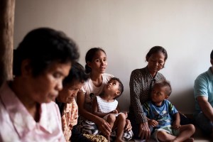 A mother of six, Pang Siphon shares her testimony about taking a job as a domestic worker in Malaysia at a weekly Bible study organized by World Relief to teach families about safe migration.