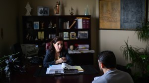 Immigration attorneys in Michigan, like Chaldean Eman H. Jajonie-Daman, meet with Christian clients seeking to avoid deportation to Iraq.