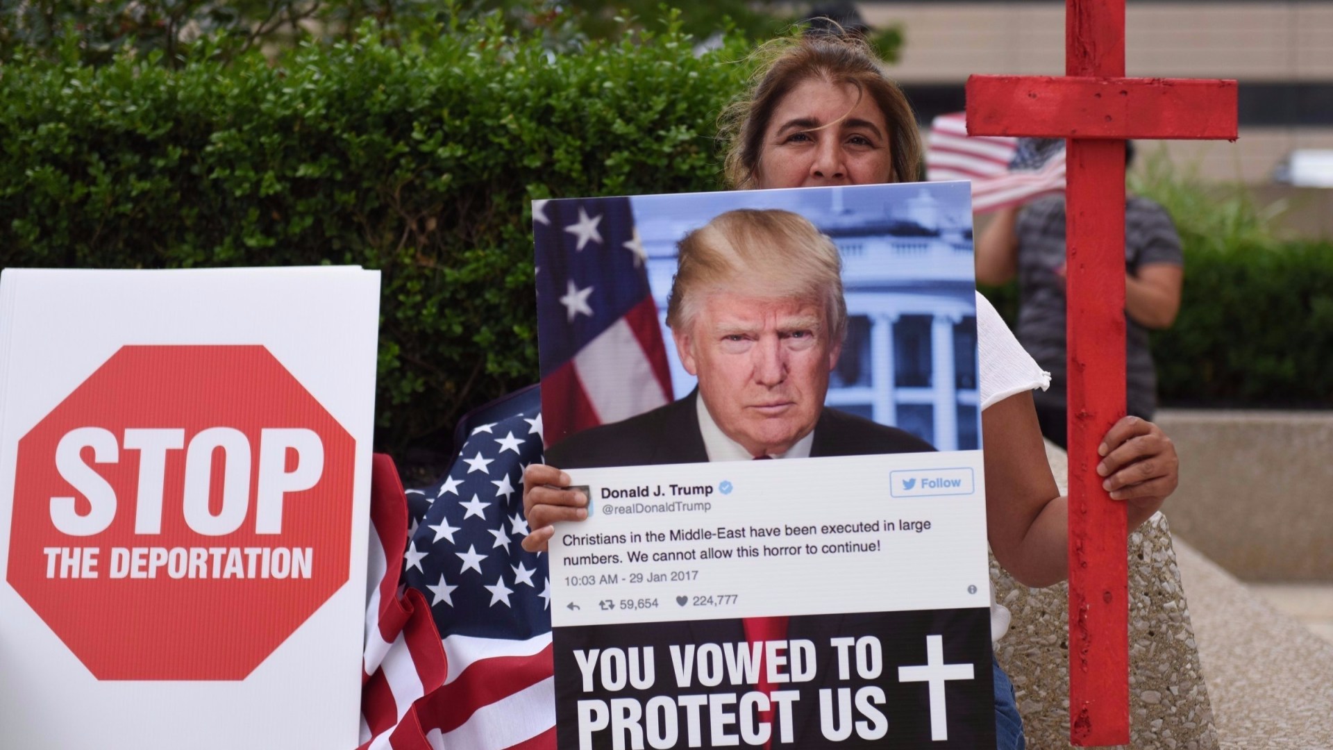 Amal Hana of Warren, Michigan, protests the detention of a family member who has lived in the US for 25 years.