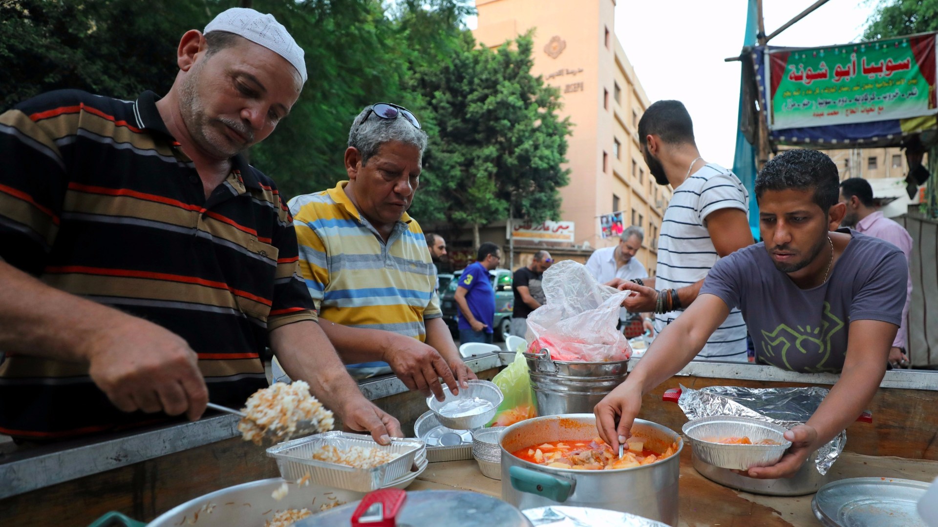 Egyptian Christians prepare a free iftar meal for Muslim neighbors in Cairo on June 18, 2017.