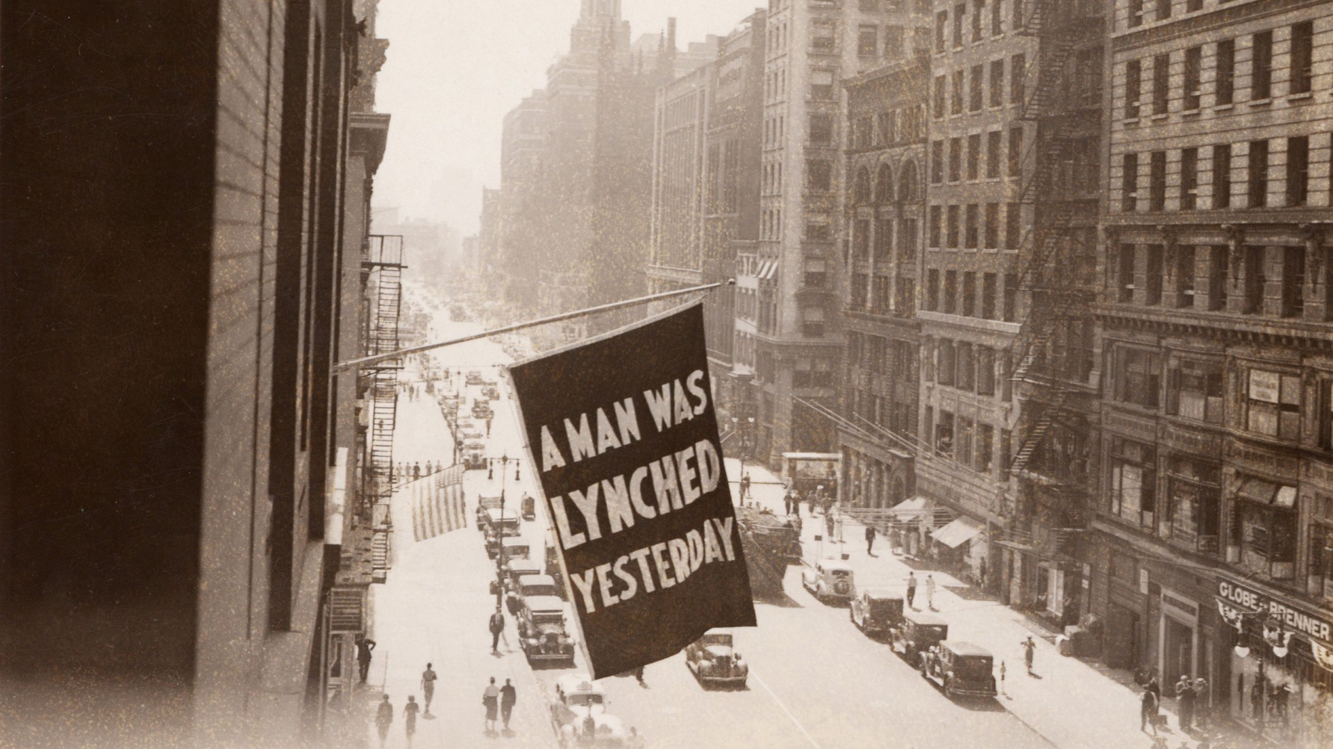 A flag announcing another lynching flies from the window of the NAACP headquarters in New York City in 1936.