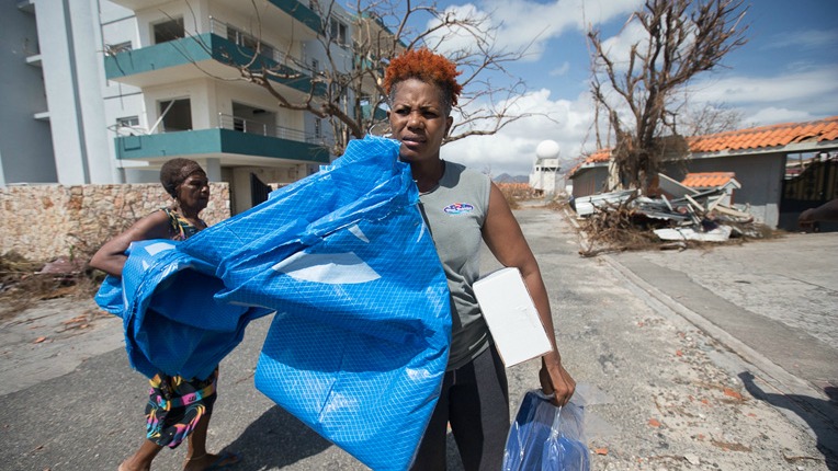 Samaritan's Purse distributes an initial delivery of supplies Sunday in St. Martin.