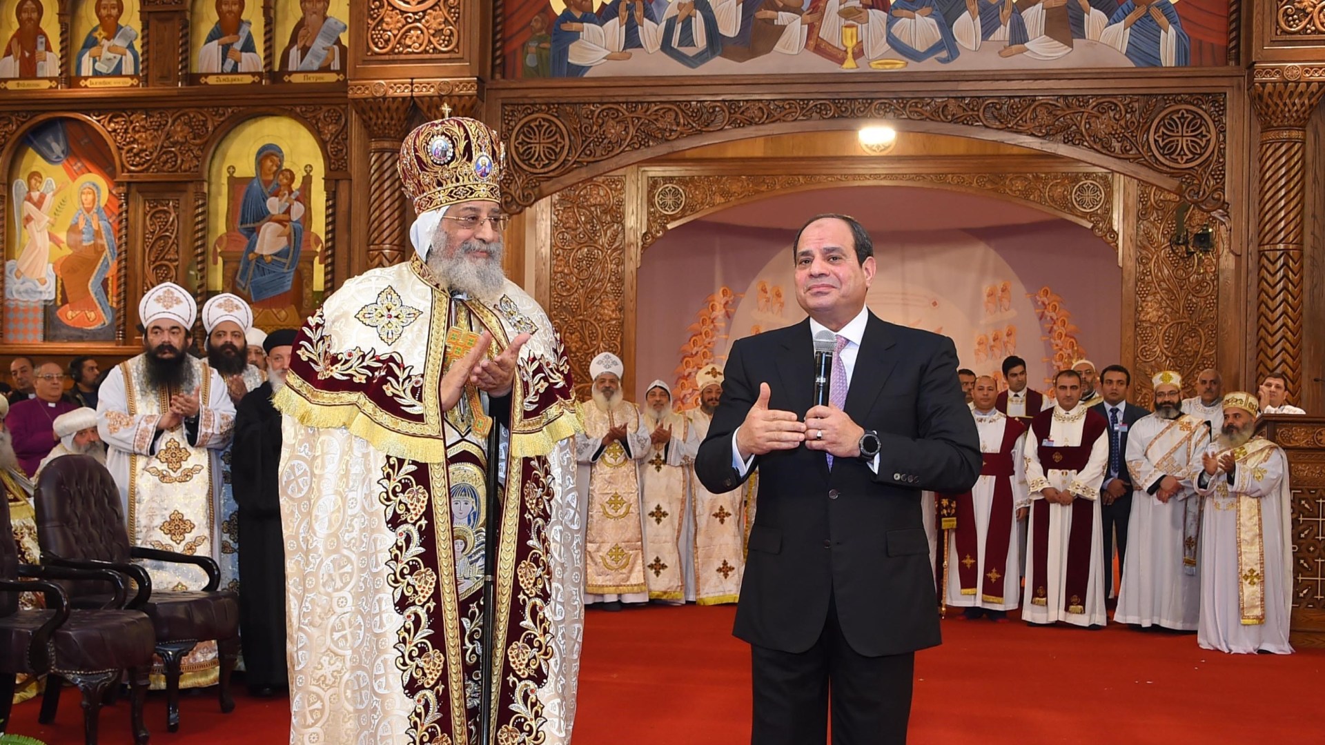 Egypt's Coptic Pope Tawadros II receives President Abdel Fattah al-Sisi during the opening ceremony of the new Coptic Cathedral in Cairo on January 6, 2018.