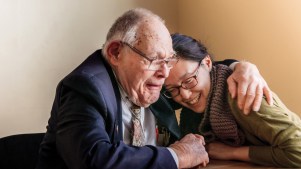 L’Arche member Charles Clark, 82, hugs volunteers and also serves as co-chair of an annual retreat-planning committee at St. Mary’s Episcopal Church in Washington, DC.