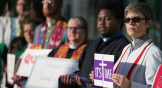 Protestors demonstrated outside the 2016 General Conference gathering.