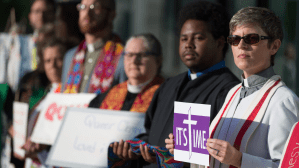 Protestors demonstrated outside the 2016 General Conference gathering.