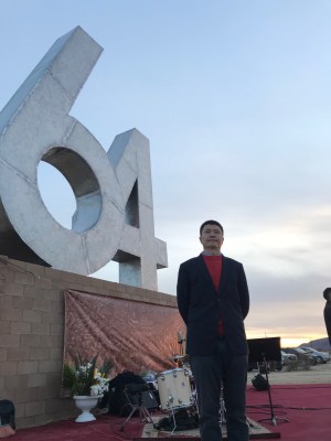 Zhou Fengsuo in front of the Tiananmen Monument erected this year in the US. “64” references the date of the massacre, June 4.