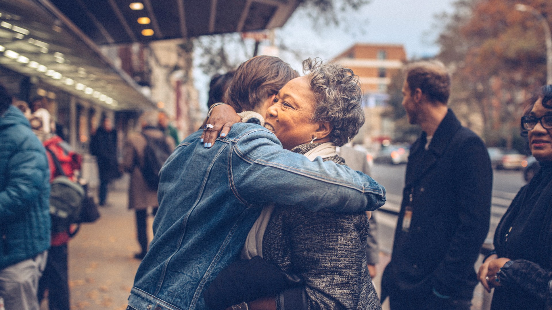 Director Brian Ivie (left) embraces Charleston church shooting survivor Polly Sheppard at the New York premiere of Emanuel at DOC NYC Film Festival in November 2018