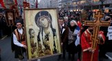 Protesters hold an Orthodox icon during a Belgrade rally held by the Serbian Orthodox Church in January to protest Montenegro's religion law.