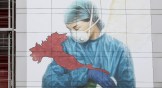 A mural dedicated to all Italian medical workers on a wall of Papa Giovanni XXIII Hospital in Bergamo, the epicenter of Italy's COVID-19 outbreak, near Milan.