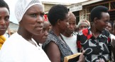 Genocide survivors gather at a Solace Ministries community meeting.