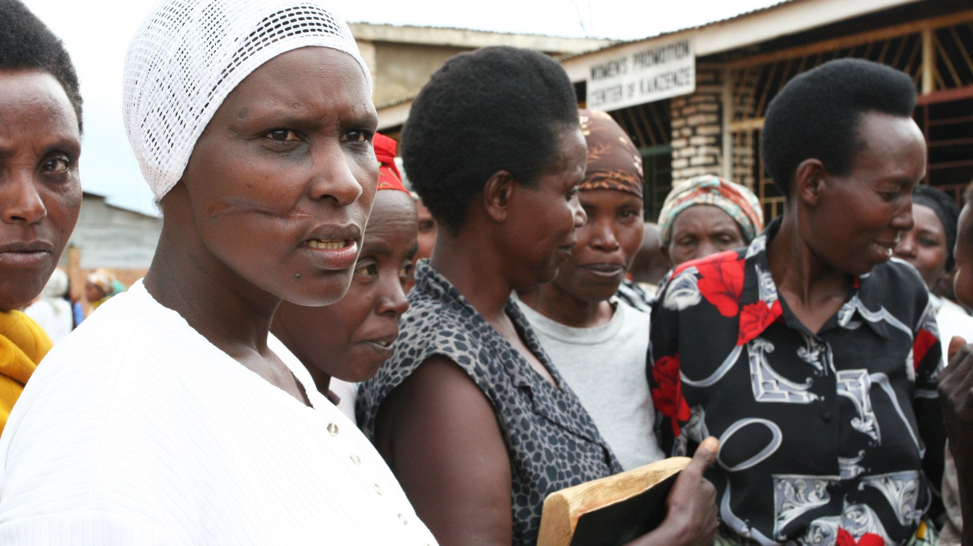 Genocide survivors gather at a Solace Ministries community meeting.