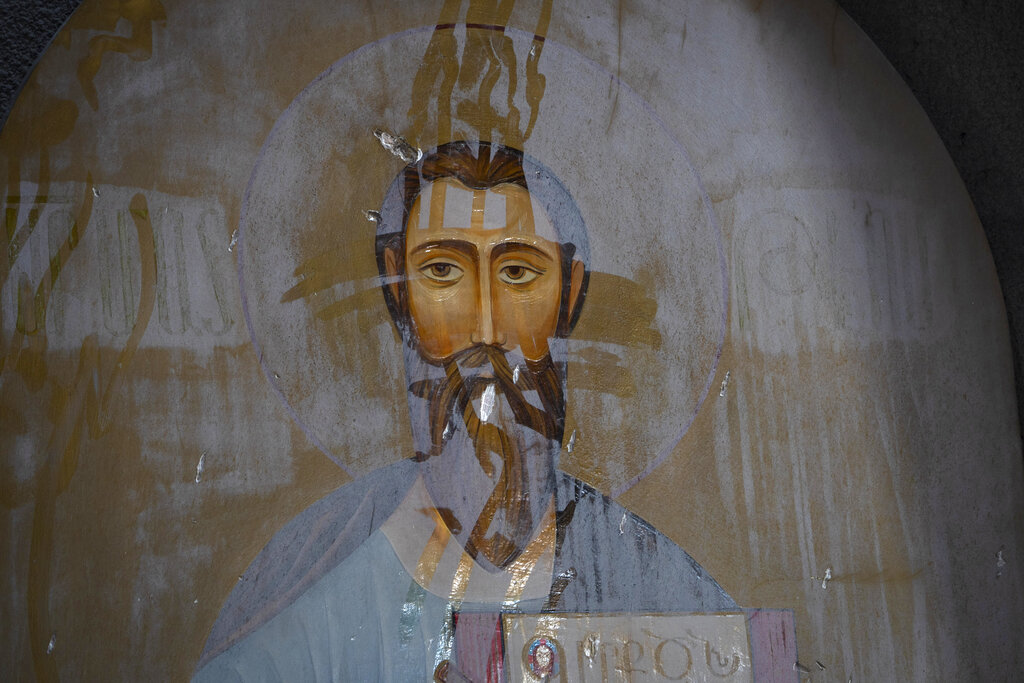 An icon covered with dust in the Holy Savior Cathedral damaged by shelling during a military conflict, in Shushi, outside Stepanakert, self-proclaimed Republic of Nagorno-Karabakh on October 8.