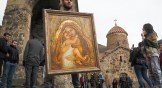 A man holds an icon from the Dadivank, an Armenian Apostolic Church monastery dating to the ninth century, as ethnic Armenians leave the separatist region of Nagorno-Karabakh on November 14.