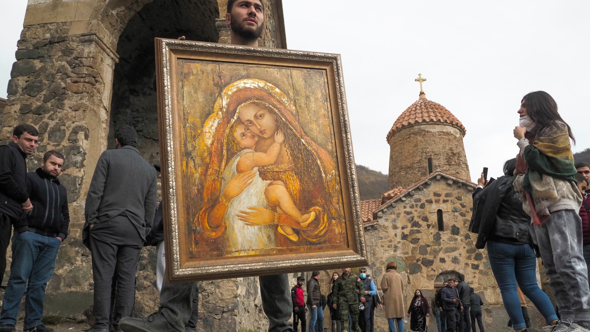 A man holds an icon from the Dadivank, an Armenian Apostolic Church monastery dating to the ninth century, as ethnic Armenians leave the separatist region of Nagorno-Karabakh on November 14.