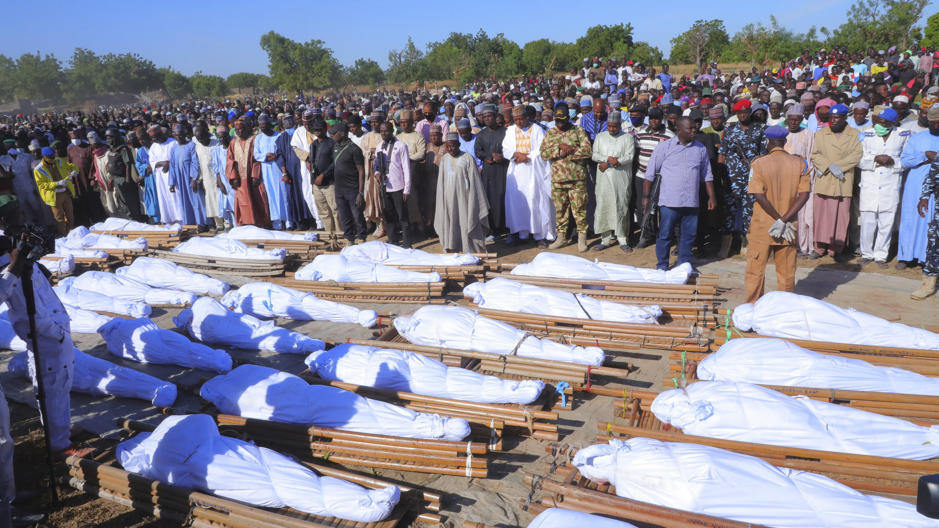People attend a funeral for those killed by suspected Boko Haram militants in Zaabarmar, Nigeria, on November 29.