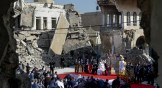 Pope Francis, surrounded by shells of destroyed churches, leads a prayer for the victims of war at Hosh al-Bieaa Church Square in Mosul, Iraq, once the de-facto capital of ISIS, on March 7, 2021.