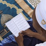 A madrasah student reads the Quran during Ramadan 2020 in Shah Alam, Malaysia.