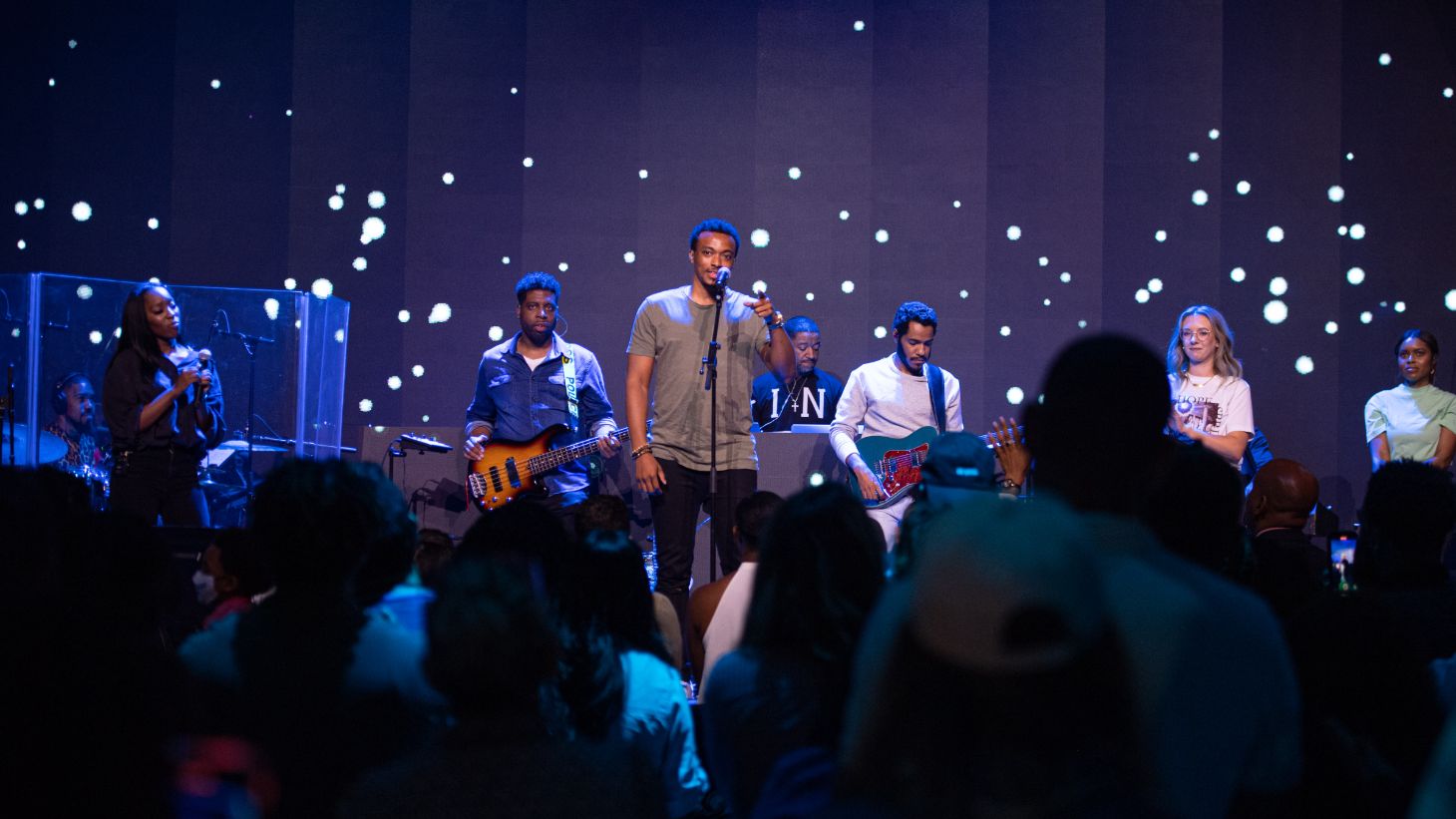 Jonathan McReynolds performs on stage during Hillsong Atlanta's opening day on June 6.
