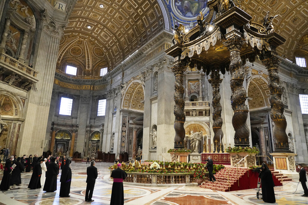 Pope Francis (left) attends a prayer with Lebanon’s Christian leaders in St. Peter’s Basilica on July 1, hosting them at the Vatican for a day of prayer amid fears that the country’s descent into financial and economic chaos is further imperiling the Christian presence in the country.