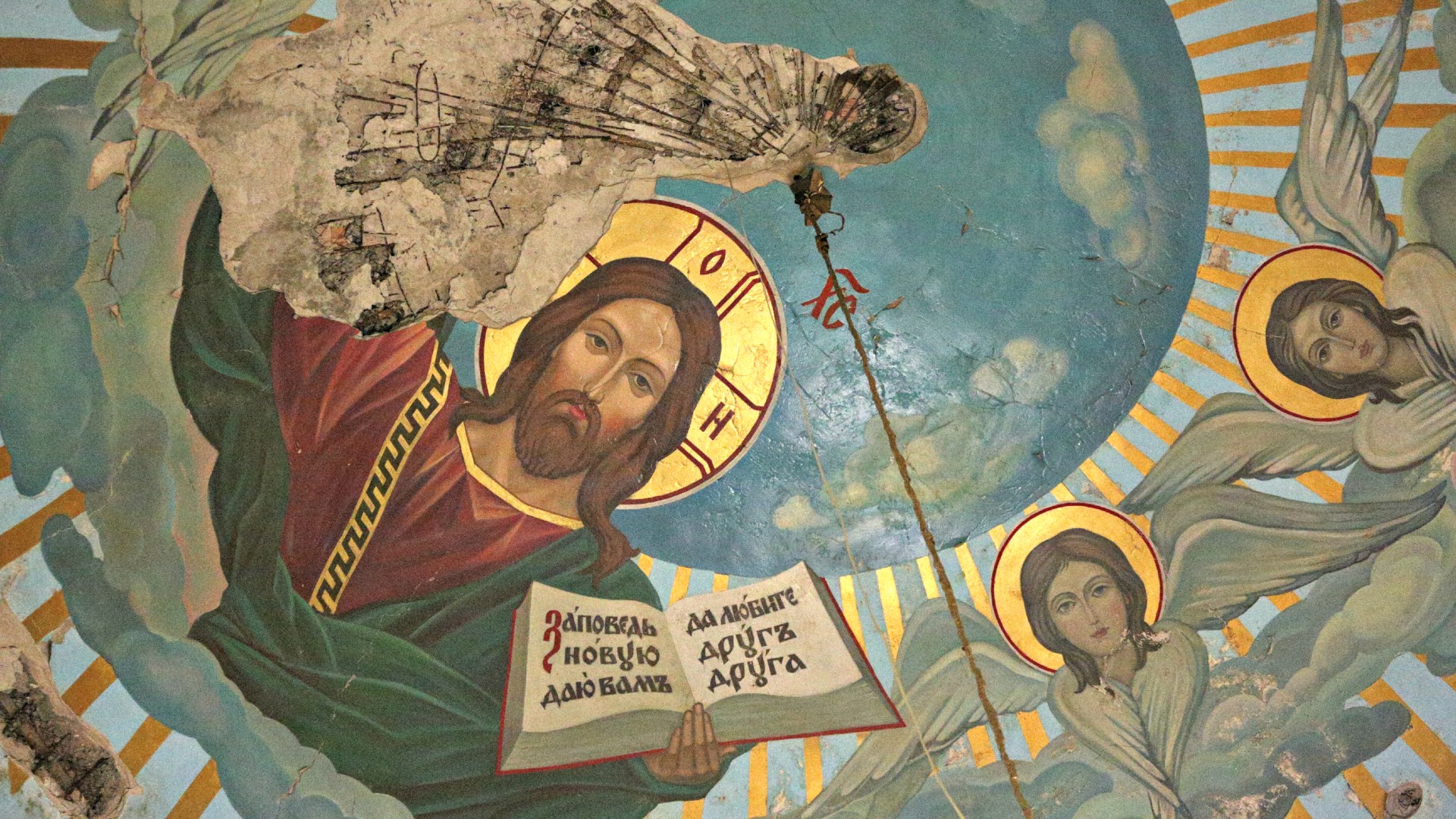 An icon of Christ damaged by shelling at St. Ignatius (Bryanchaninov) Church in Donetsk, Ukraine, seen in April 2017.