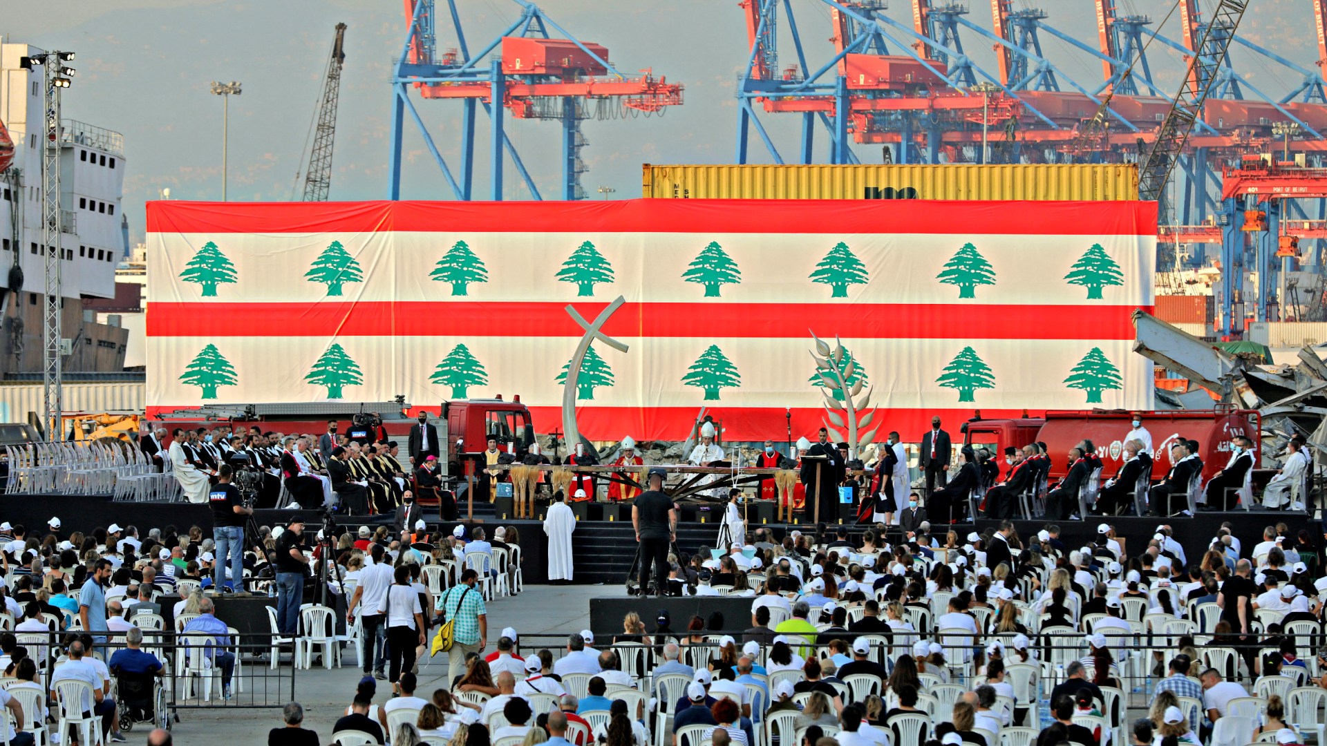 Maronite Catholic Patriarch Bechara al-Rai leads a Mass at the port of Lebanon’s capital Beirut on August 4, 2021, on the first anniversary of the blast that ravaged the port and the city.