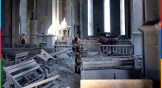A soldier looks at the damage done to Ghazanchetsots (Holy Savior) Cathedral in Nagorno-Karabakh in October 2020.