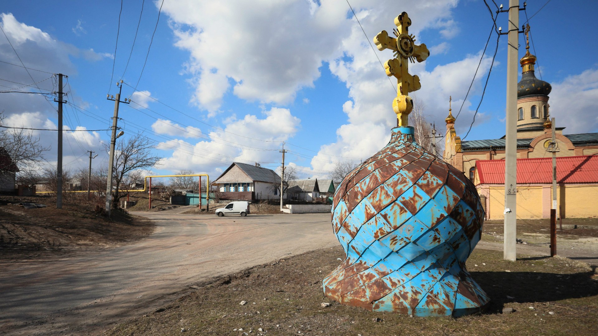 A cupola of a destroyed Orthodox church is seen in the town of Avdiivka in the Donetsk region located on Ukraine's frontline with Russia-backed separatists on February 21, 2022.