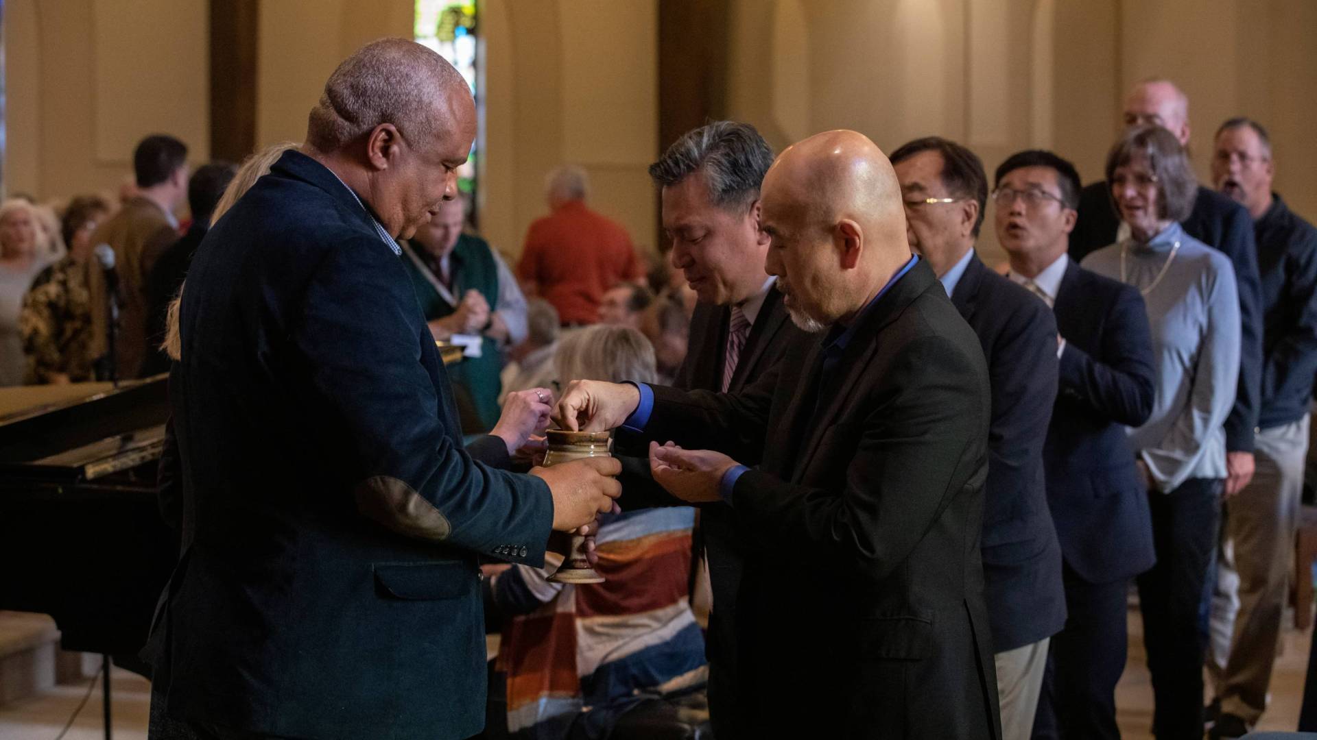 Leaders with the Global Methodist Church gather for worship.