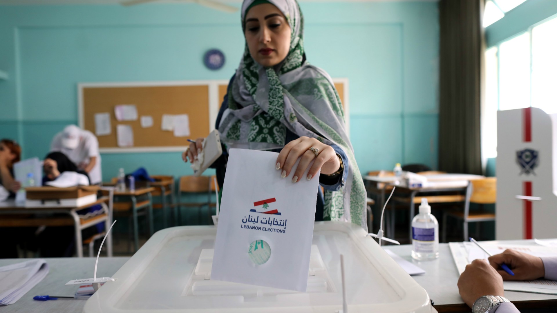 A woman casts her ballot in parliamentary elections on May 15, 2022 in Beirut, Lebanon.