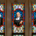 Charles Wesley, John Wesley, and Francis Asbury depicted in stained glass at a church in Lake Junaluska, North Carolina.