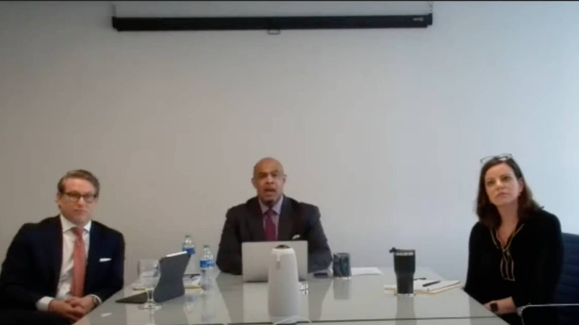 Lawyers Gene Besen and Scarlett Singleton Nokes with EC interim president Willie McLaurin (center)