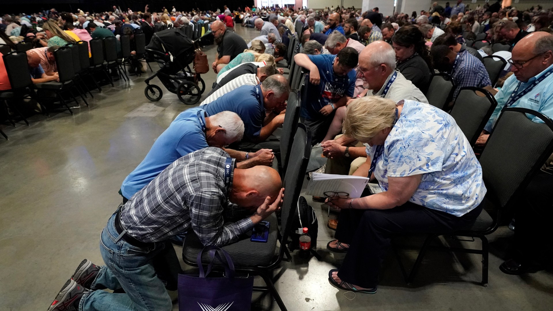Southern Baptists pray in Nashville at the 2021 annual meeting.