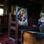 Burnt icons and wooden benches inside Abu Seifein Coptic Orthodox Church in Imbaba after a massive fire broke out during a Sunday service on August 14, 2022.