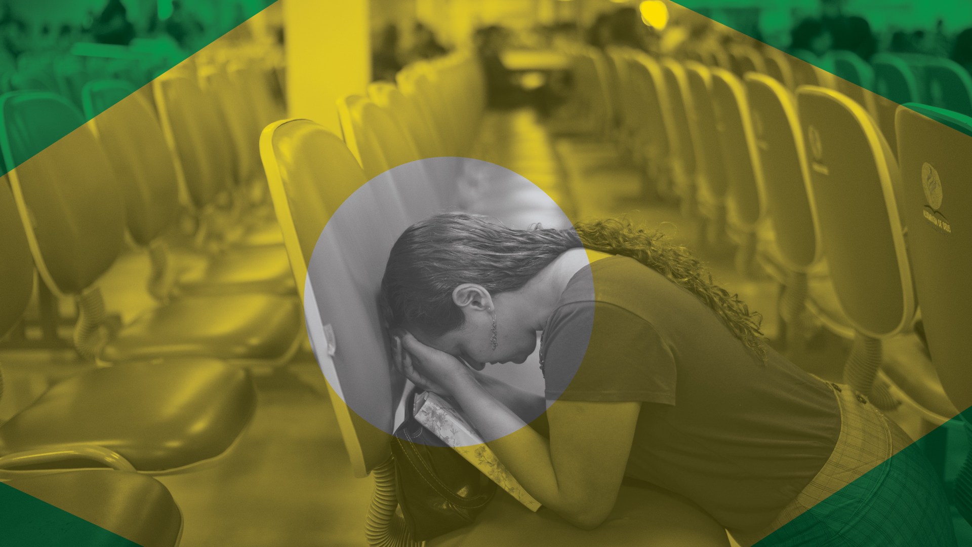 An evangelical woman kneels in prayer at a megachurch in Brazil.