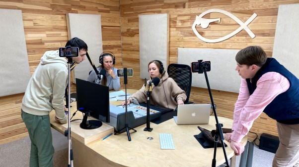 New Life Radio staffers during a broadcast