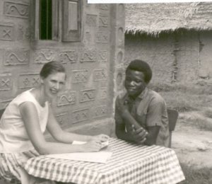 Barnwell in Ovonum, a village in Nigeria’s Mbembe area, with Livinus Enyam, who helped her learn the Mbembe language and begin developing an orthography, 1964