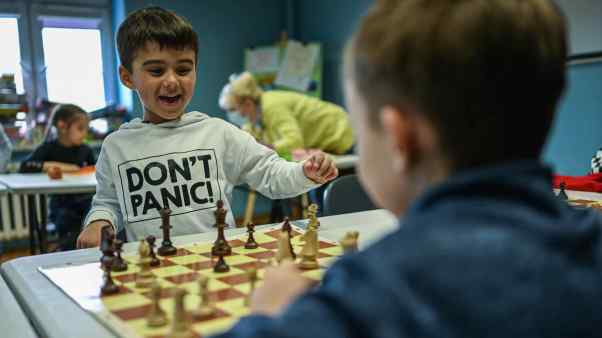 Children practice chess at the Dr Henryk Jordan Youth Center in Poland.