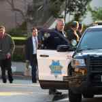 San Francisco police officers and F.B.I. agents gather in front of the home of U.S. Speaker of the House Nancy Pelosi after an attack on her husband Paul Pelosi.
